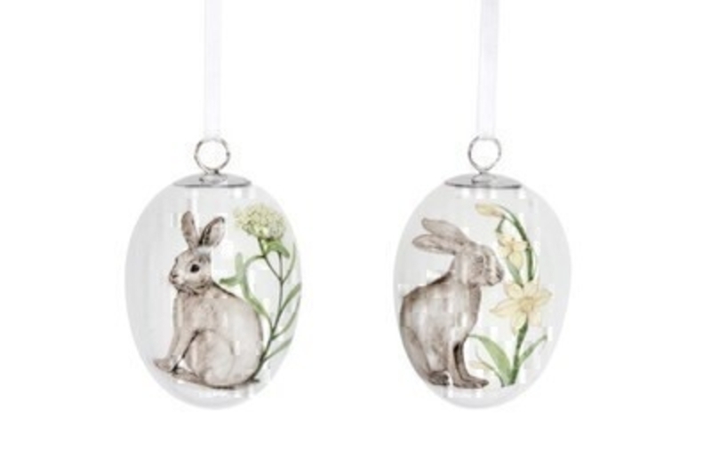 If you are looking for some Easter decorations for your Easter Tree then be sure not to miss these cute ceramic Easter Eggs decorated with Easter rabbits. These hanging decorations are made by designer Gisela Graham. Choice of 2 available (please specify when ordering which one you would like)  If two are ordered we will send you one of each. Comes complete with string to hang on your Easter Tree.
